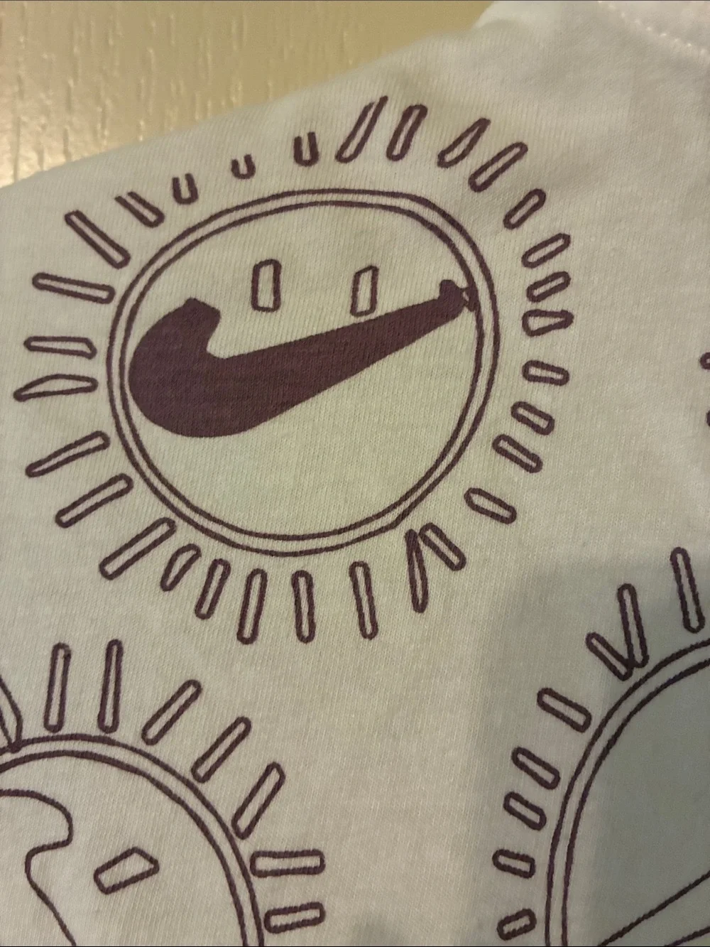 Nike White Tee with Purple Sun Graphics